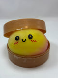 Jeu sensoriel Bun Squishy arc-en-ciel rose et jaune