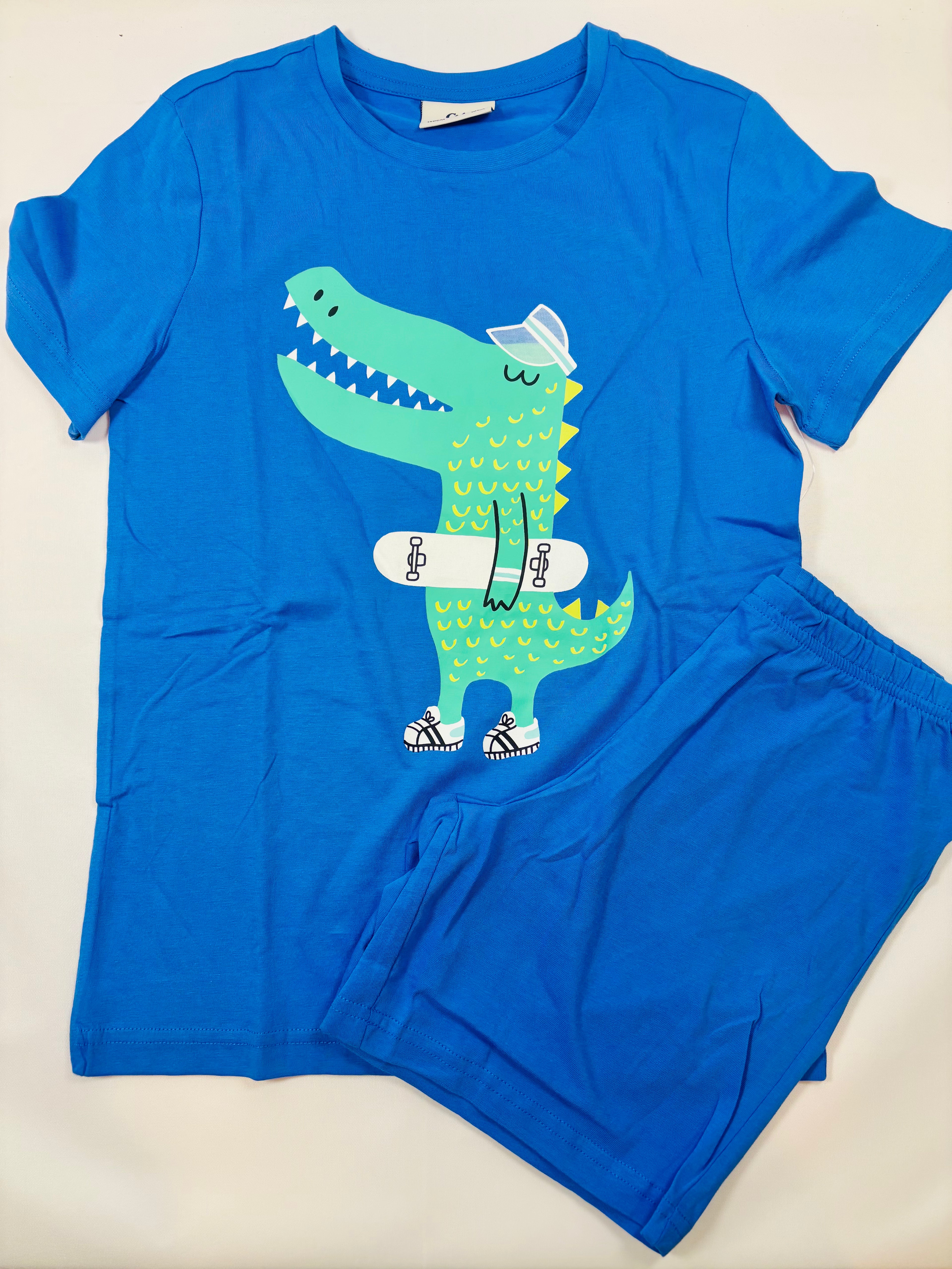 Ensemble court motif Crocodile – Bleu 140 (C&A)