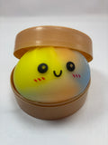 Jeu sensoriel Bun Squishy arc-en-ciel orange, bleu et jaune