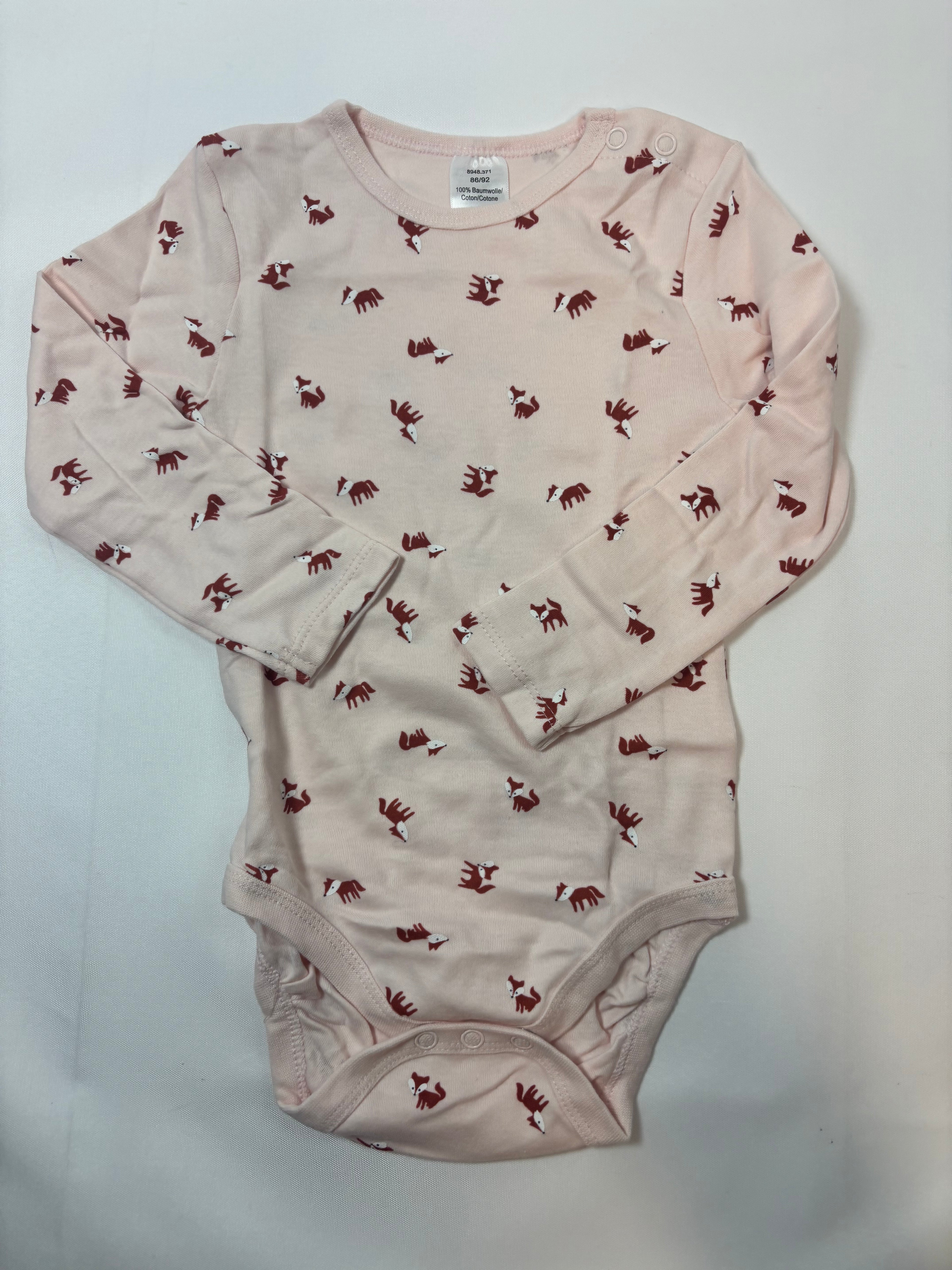 Body rose motif animaux Smile – Taille 86/92