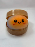 Jeu sensoriel Bun Squishy arc-en-ciel orange et bleu