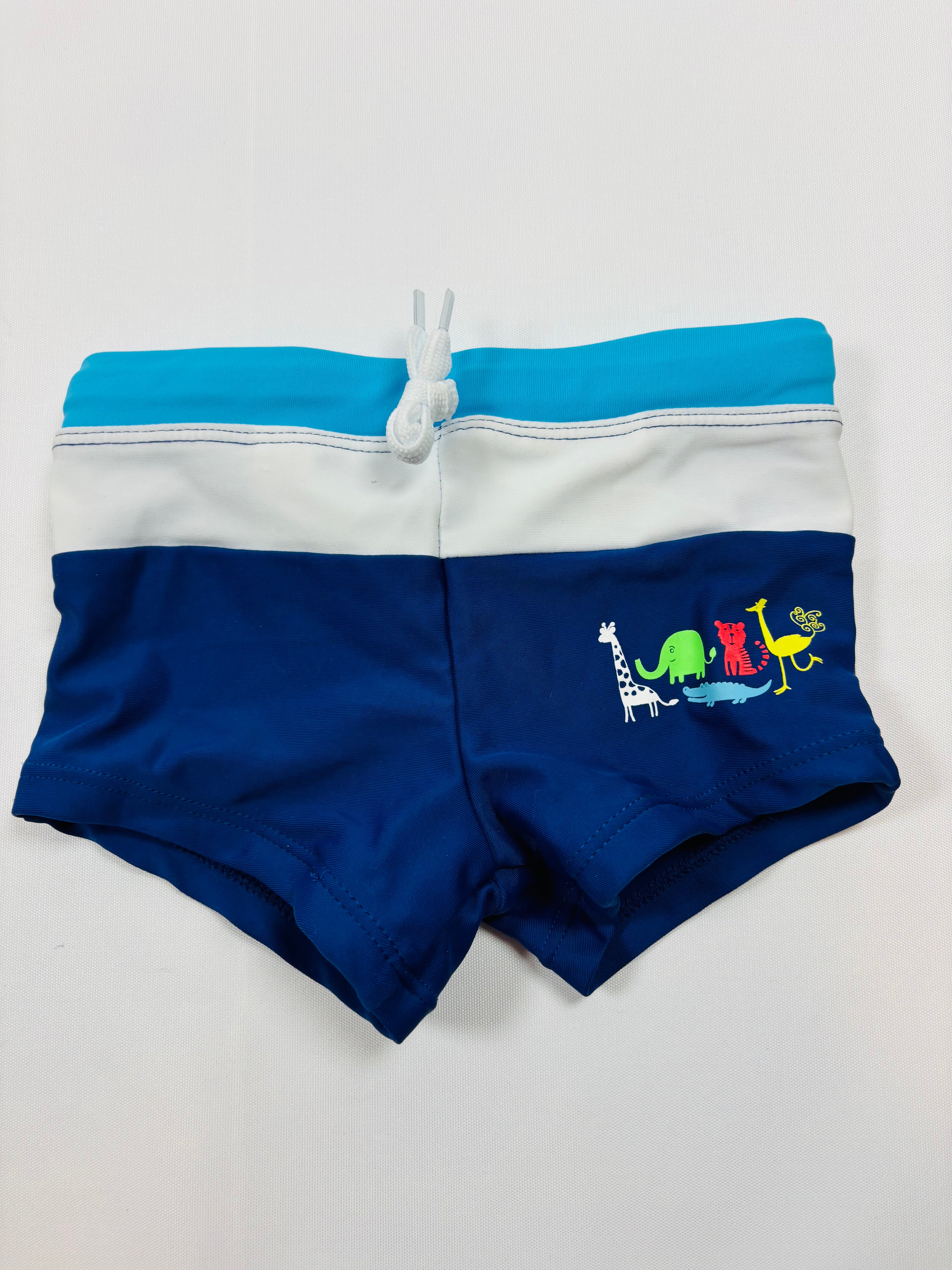 Maillot de bain bleu et blanc Migros – Garçon taille 86