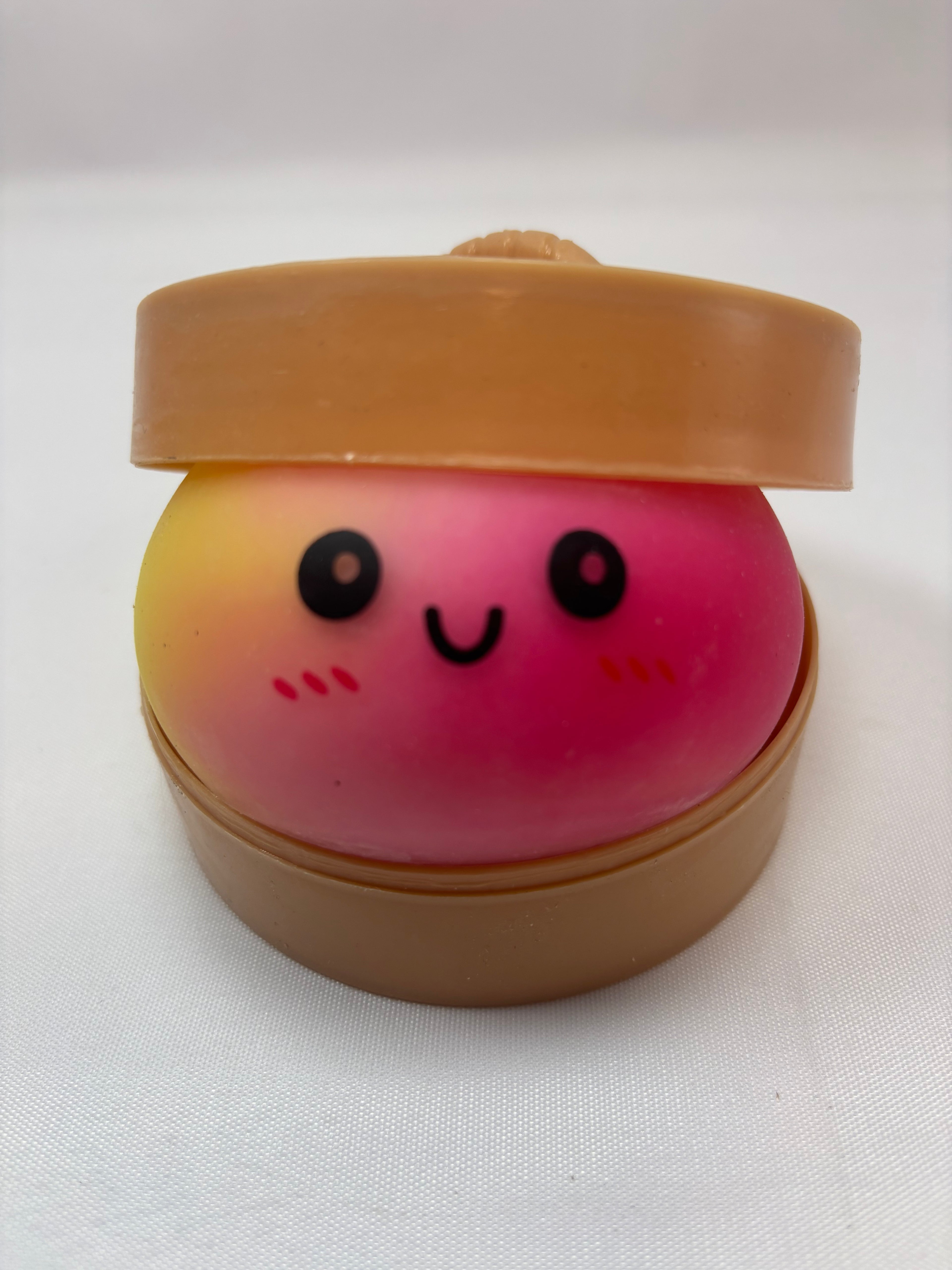 Jeu sensoriel Bun Squishy arc-en-ciel orange et rose