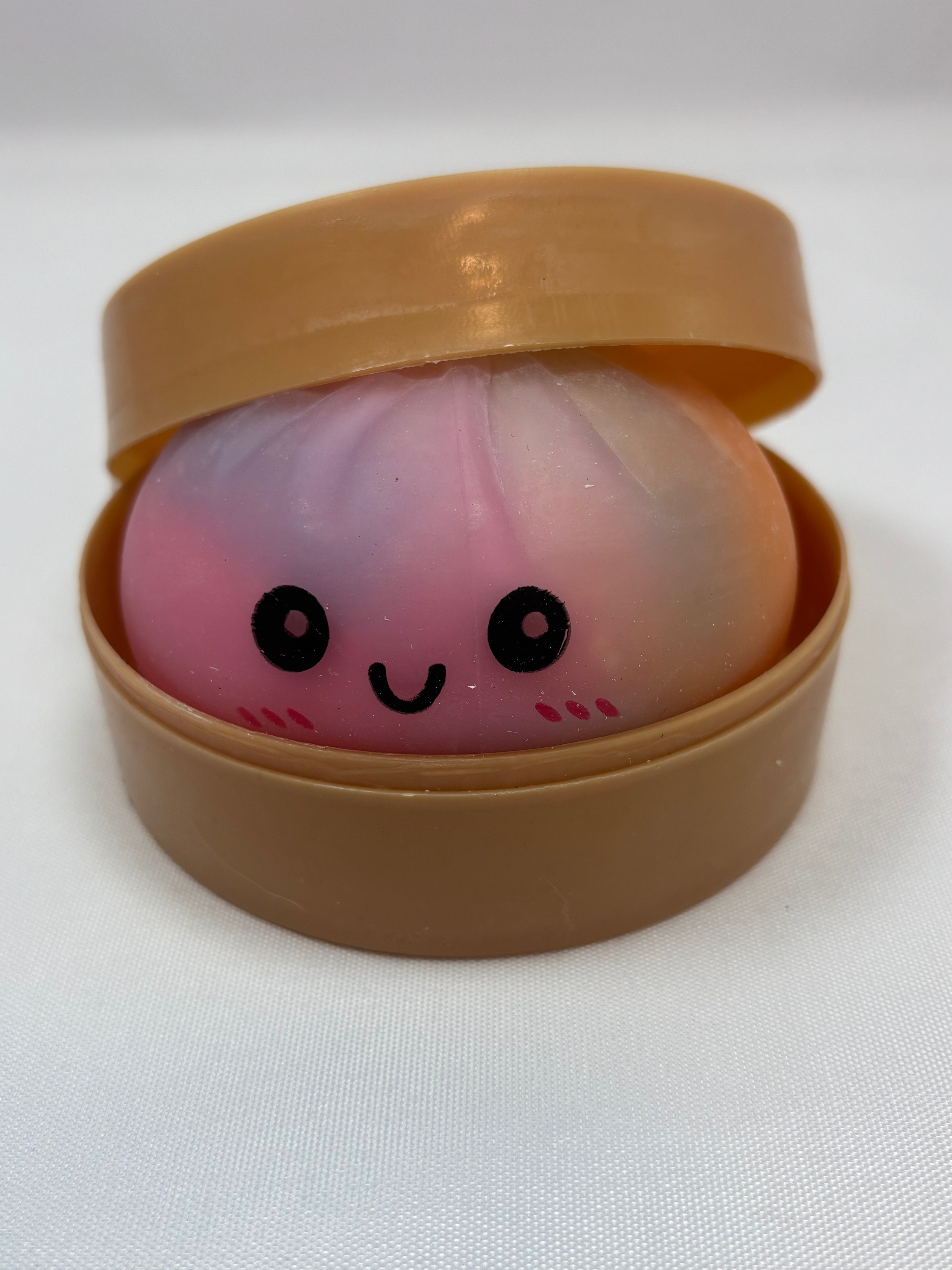 Jeu sensoriel Bun Squishy arc-en-ciel rose et violet