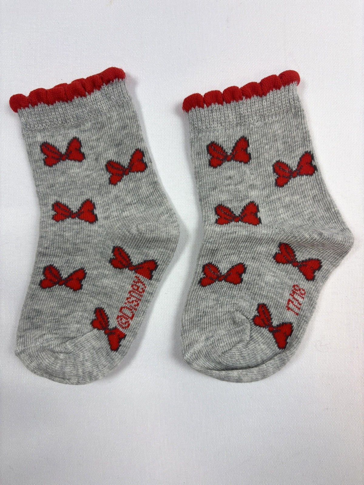Chaussettes Orchestra grises motif nœud rouge – 17–18 – Neuves