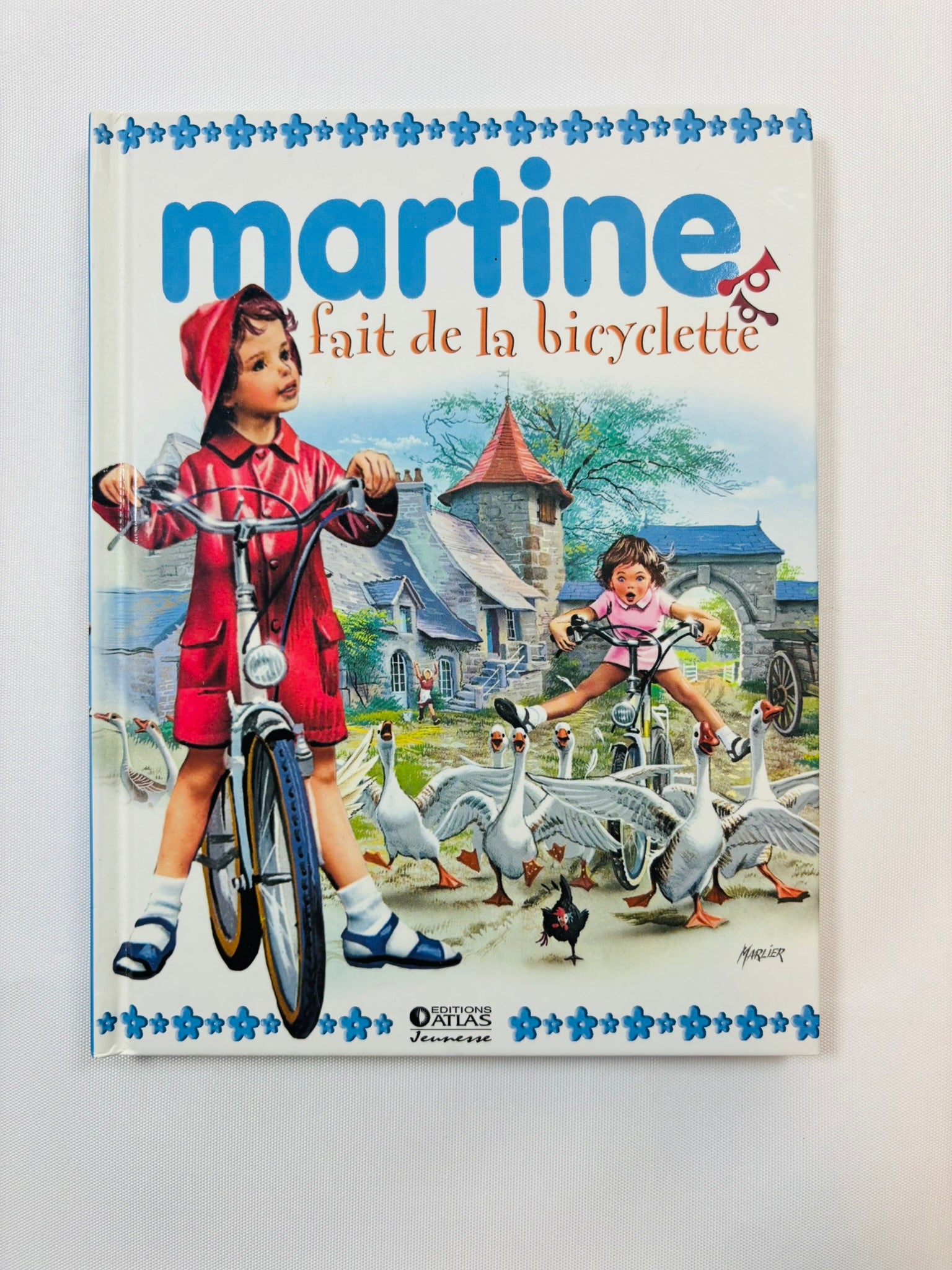 Martine fait de la bicyclette – Éditions Atlas