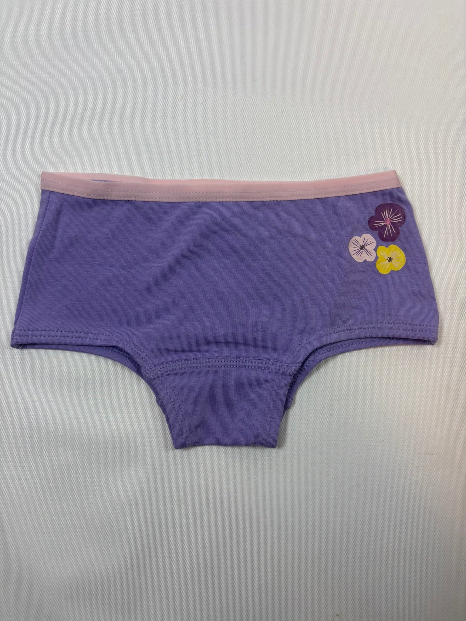 Slip violet motif fleurs fille Migros – taille 98-104