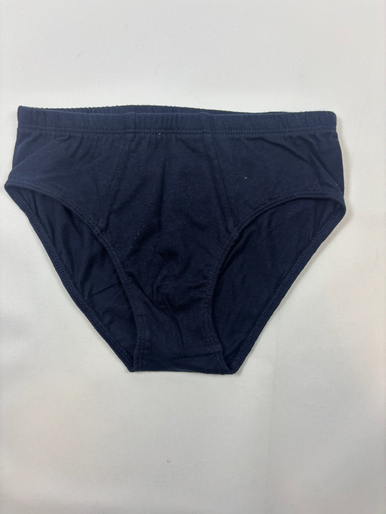 Slip bleu foncé uni garçon Migros – taille 110-116